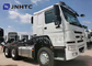 371HP Sinotruk Howo 6x4 25 Ton Truk Traktor Diesel Dengan Kepala Trailer