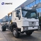 Heavy Truck HOWO Diesel Cargo Truck 4x4 6 Wheeler Chassis Dengan Crane Kualitas Tinggi
